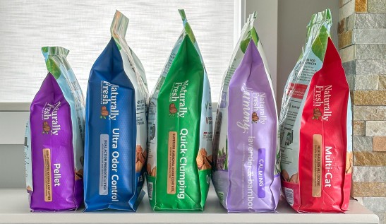 Side view of packaging of all five Naturally Fresh Formula bags on a counter
